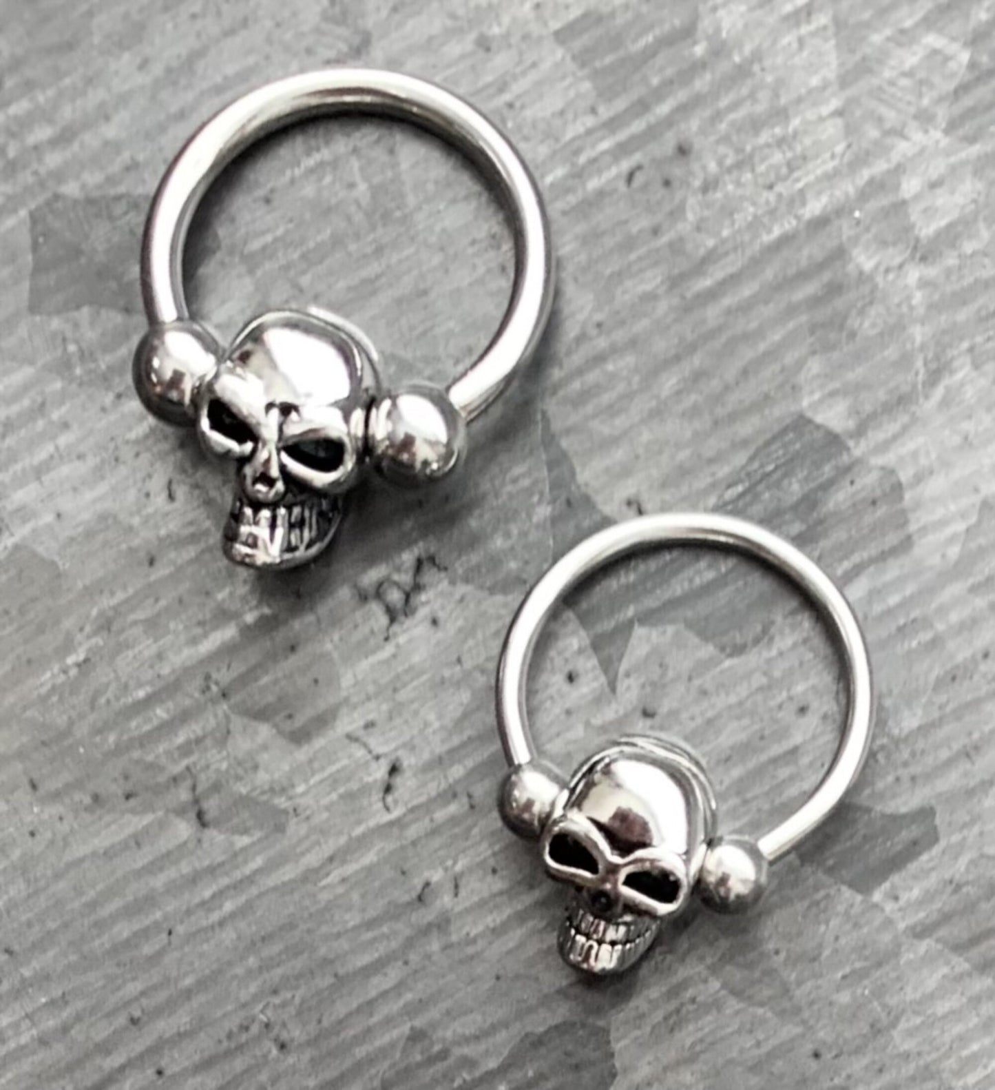 1 Piece Unique Skull 316L Surgical Steel Captive Bead Ring / Circular Barbell - Gauges 14g or 16g with a 1/2" internal diameter!