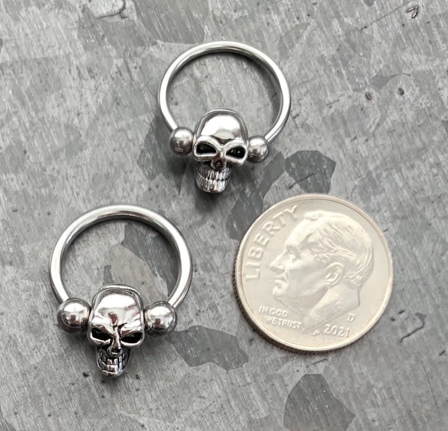 1 Piece Unique Skull 316L Surgical Steel Captive Bead Ring / Circular Barbell - Gauges 14g or 16g with a 1/2" internal diameter!