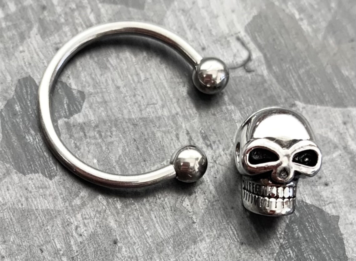 1 Piece Unique Skull 316L Surgical Steel Captive Bead Ring / Circular Barbell - Gauges 14g or 16g with a 1/2" internal diameter!