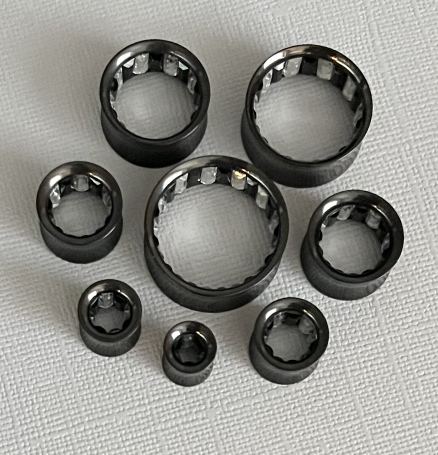 PAIR of Unique Inner Clear / Black Gems Black Ion Plated Steel Saddle Tunnels/Plugs - Gauges 0g (8mm) thru 1" (25mm) available!