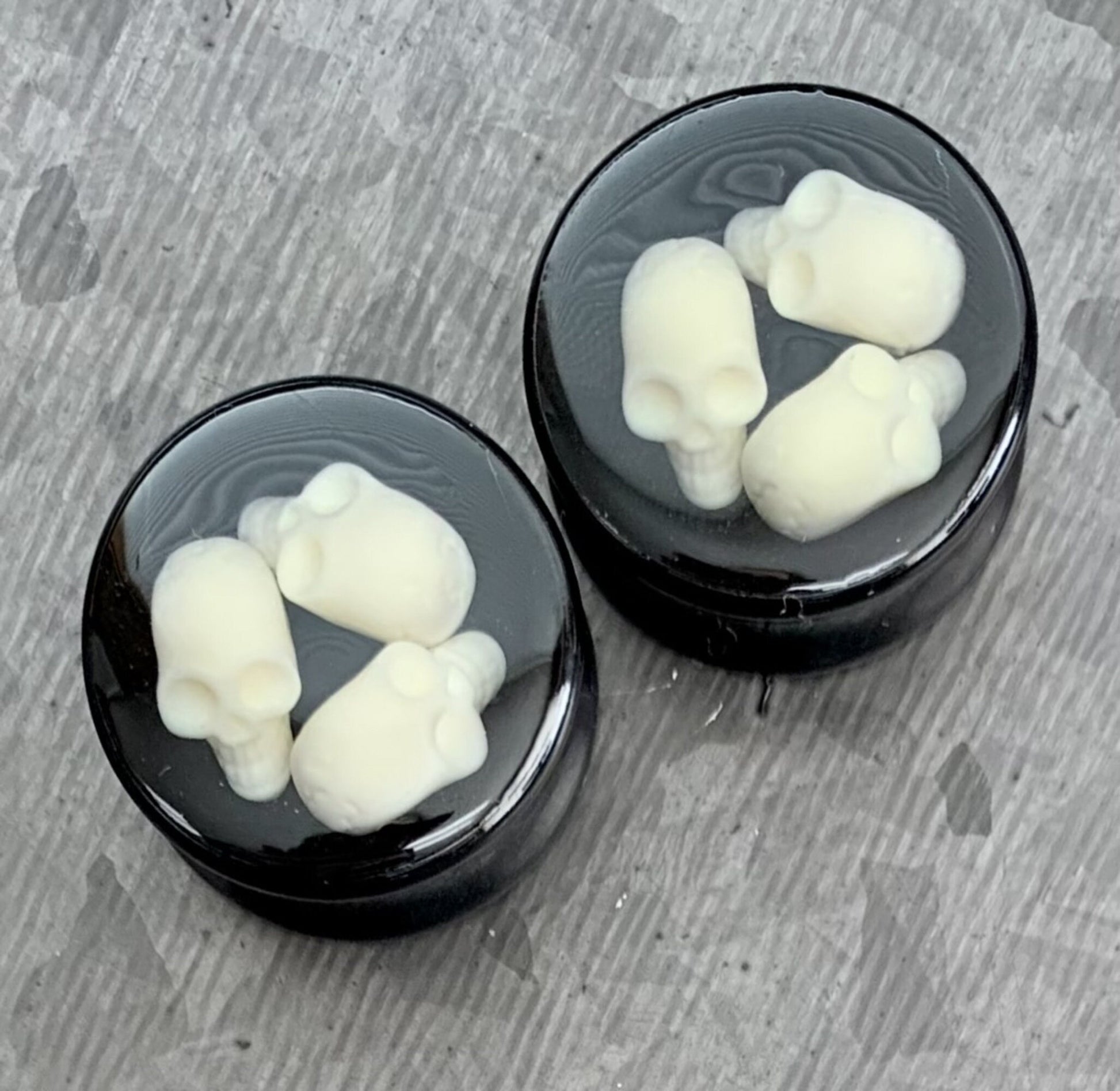 PAIR of Unique Triple Skull Encased Black Acrylic Saddle Plugs - Gauges 00g (10mm) thru 15/16" (24mm) available!