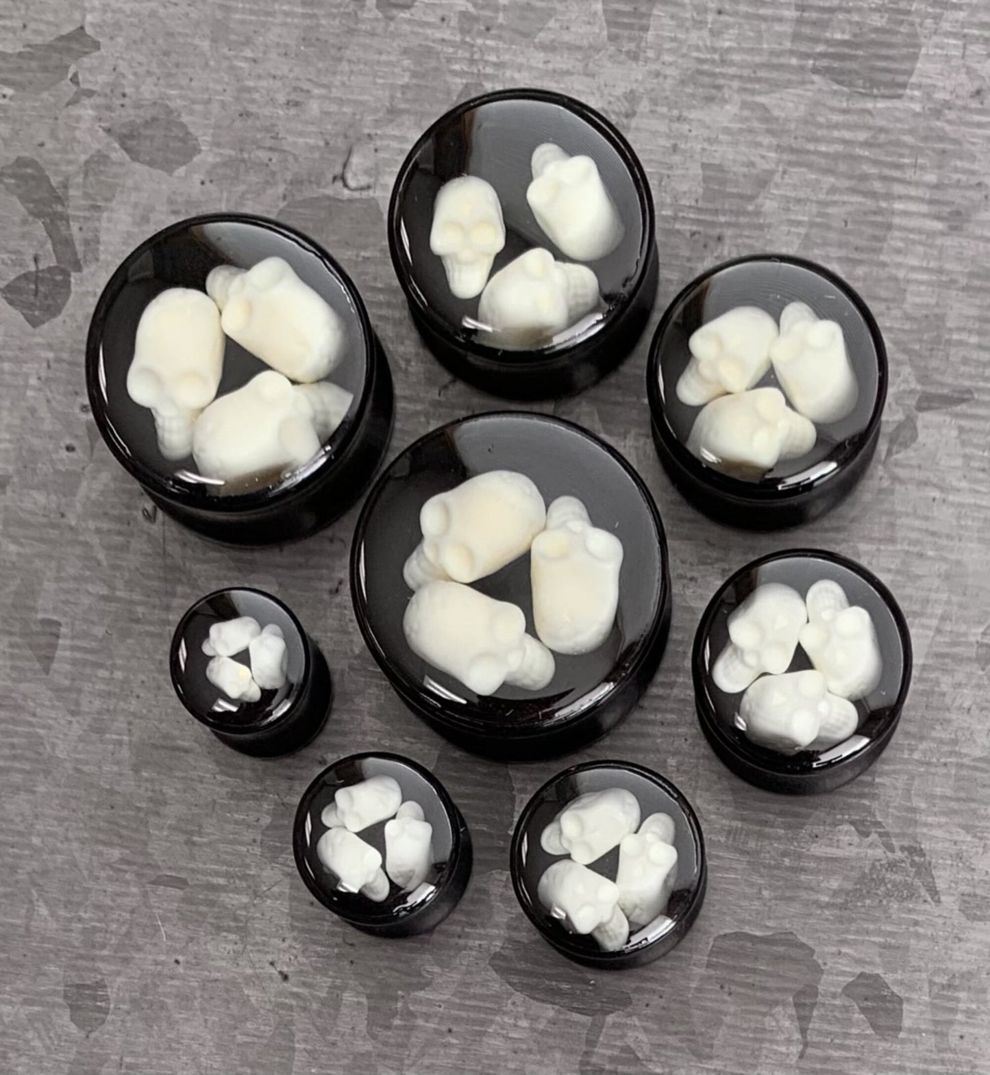 PAIR of Unique Triple Skull Encased Black Acrylic Saddle Plugs - Gauges 00g (10mm) thru 15/16" (24mm) available!