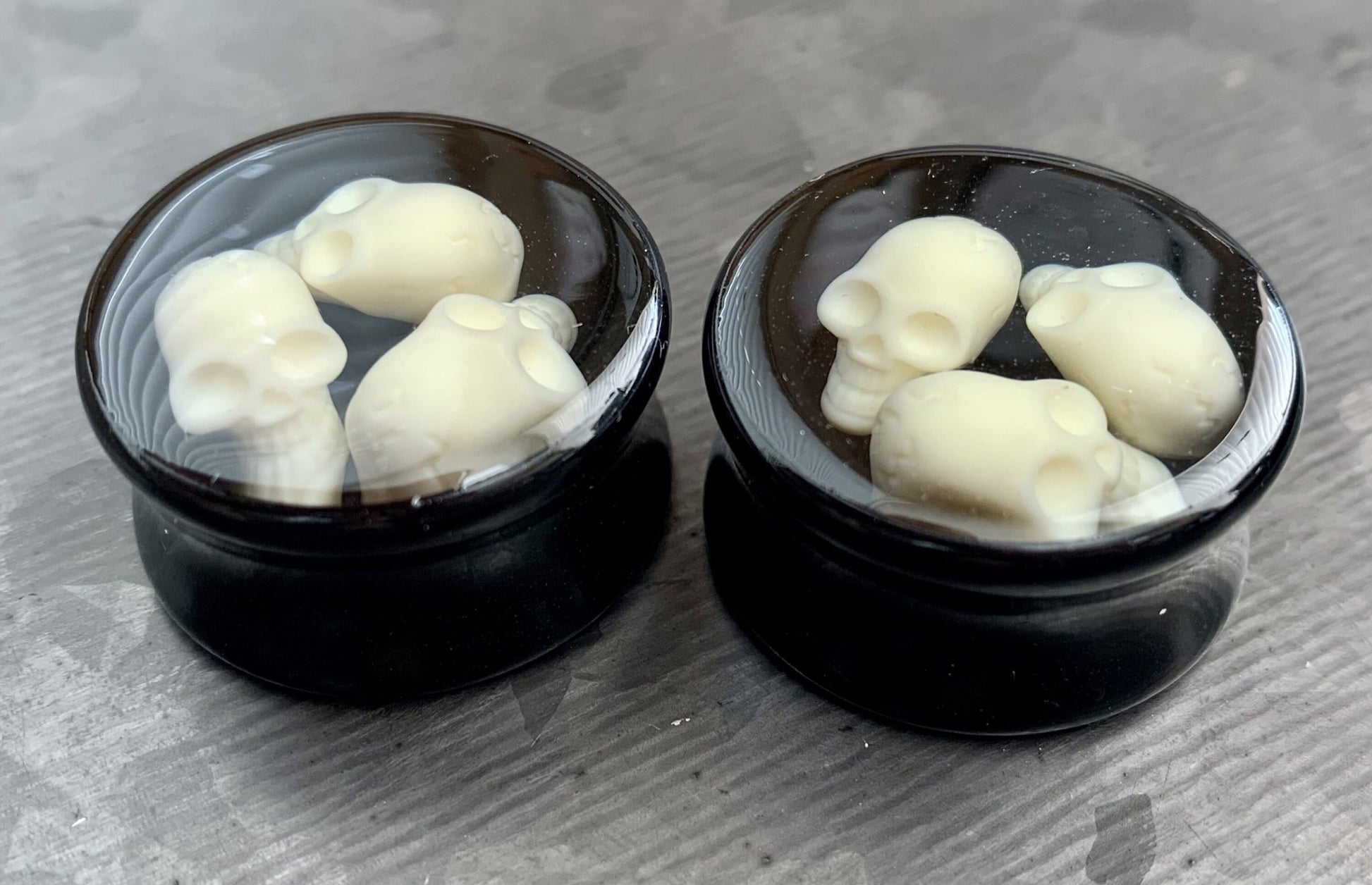 PAIR of Unique Triple Skull Encased Black Acrylic Saddle Plugs - Gauges 00g (10mm) thru 15/16" (24mm) available!