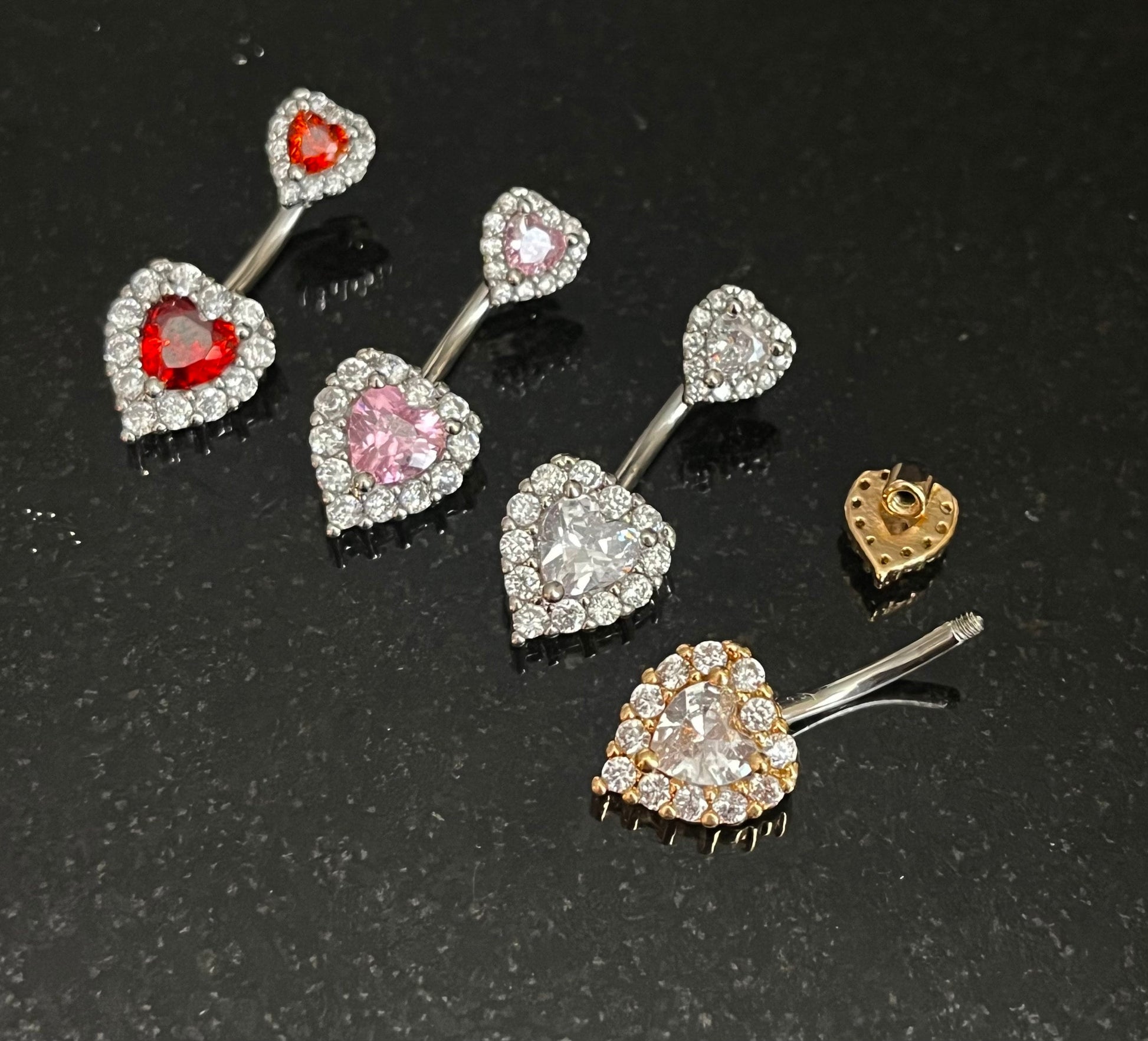 1 Piece Brilliant Gem Surrounded Hearts Button Ring Navel / Naval Belly Ring - 14g - 10mm - Available in Clear, Gold, Pink,and Red/Orange!