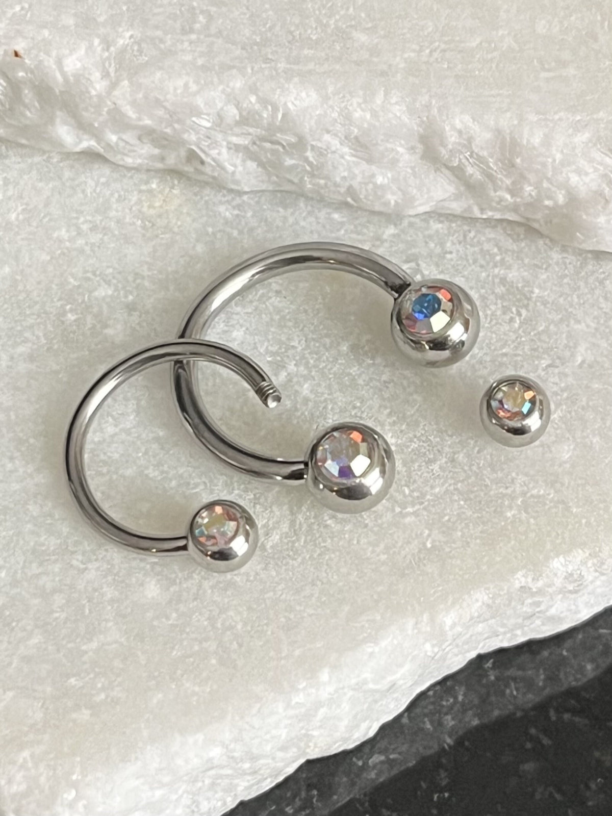 1 Piece Stunning Front Facing CZ Gems 316L Surgical Steel Circular Horseshoe Septum Ring - 16g or 14g - Available in a Variety of Colors!